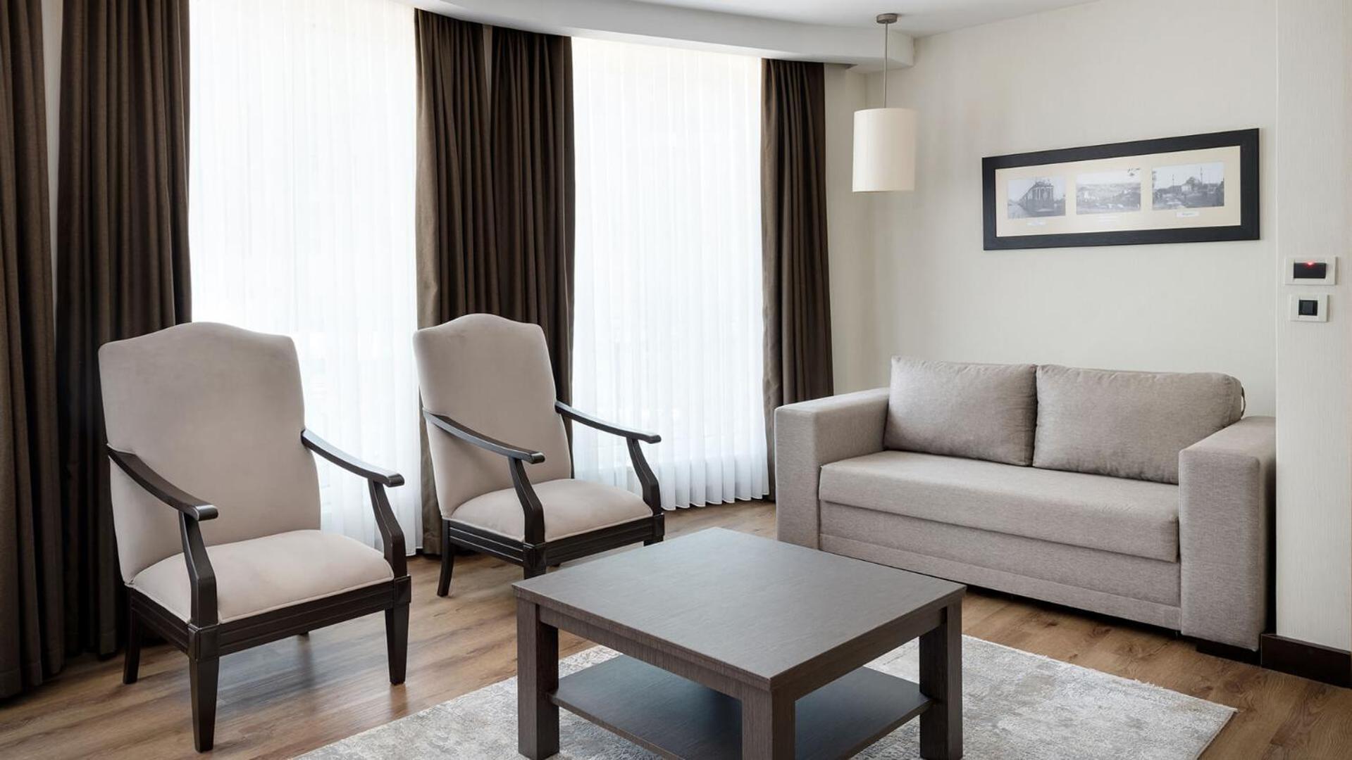 Ramada Plaza By Wyndham Istanbul City Center (Adults Only) Exterior foto A living room